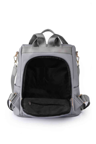 Vertical Pom-Pom Zipper Backpack